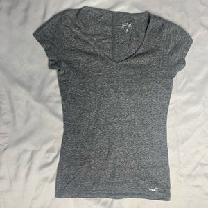 Light gray t-shirt.